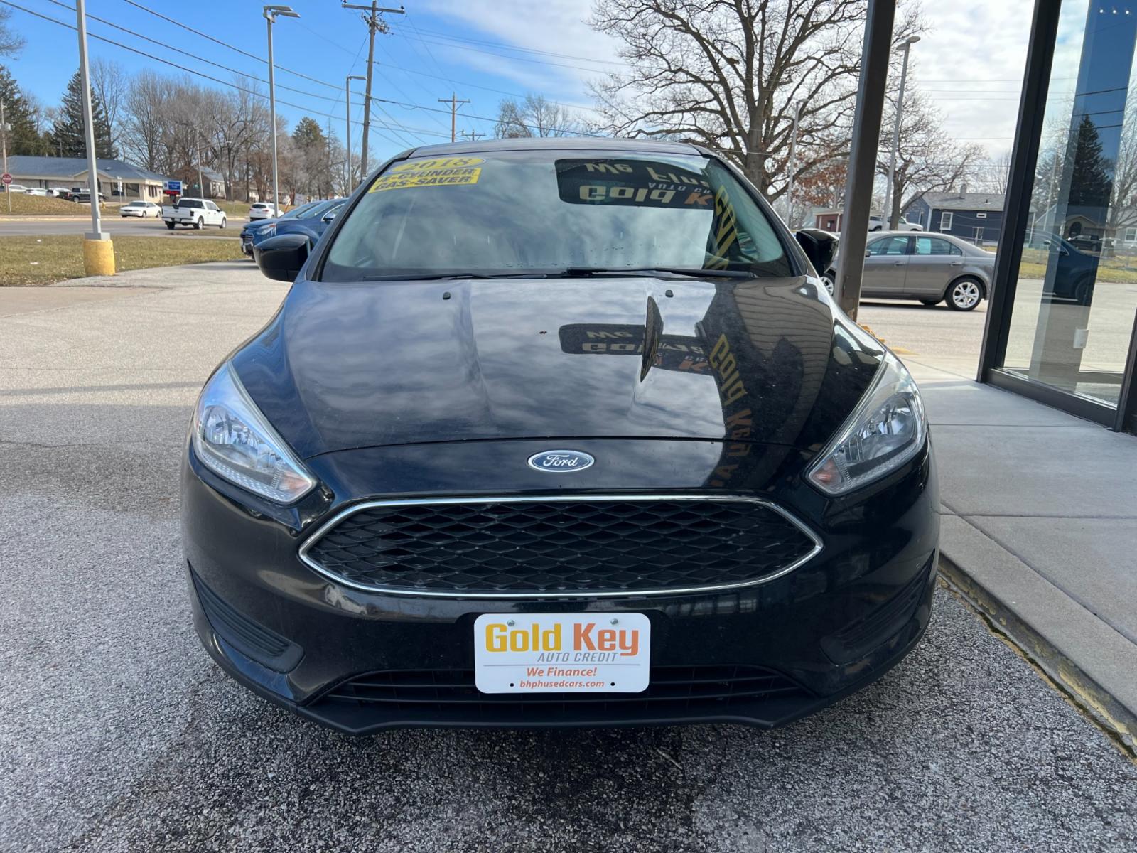 2018 Shadow Black Ford Focus SEDAN 4-DR (1FADP3FE7JL) with an 1.0L L3 engine, located at 1633 W Kimberly, Davenport, IA, 52806, (563) 323-5341, 41.559456, -90.598732 - Photo #2